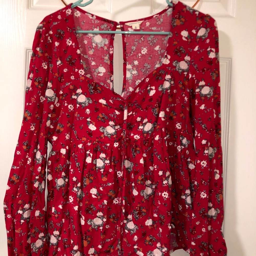 Pink floral flowy top.